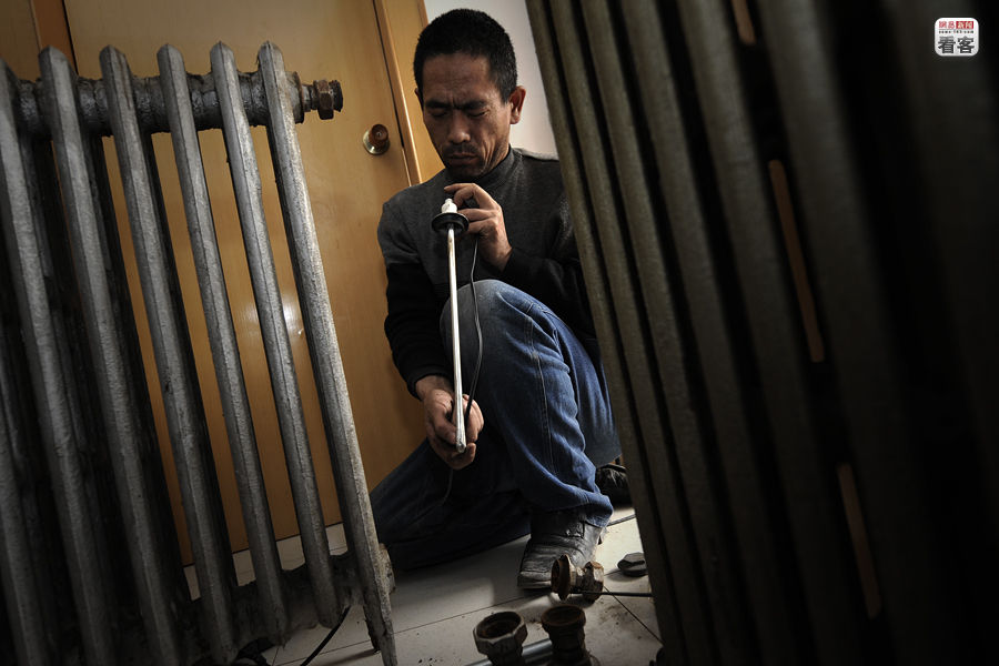 整个小区停止供暖后,过冬成了一个难题.徐海威说,等天气再高清图片